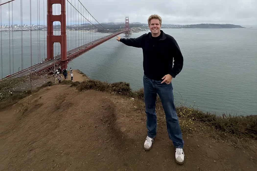 Standing by the Golden Gate Bridge in San Francisco